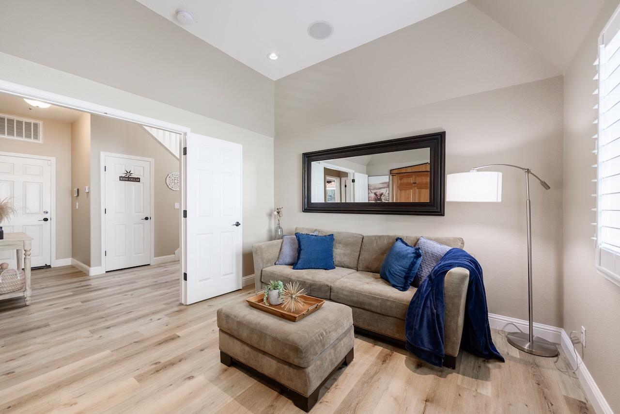 307 Sidesaddle Circle Scotts Valley, CA 95066 - Photo 68 of 116 a living room with furniture and a painting on the wall