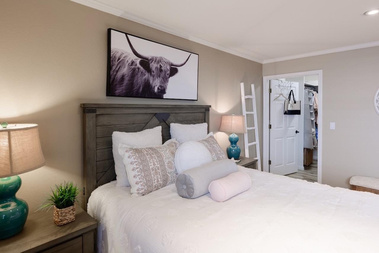 307 Sidesaddle Circle Scotts Valley, CA 95066 - Photo 71 of 116 a bedroom with a bed and a painting on the wall