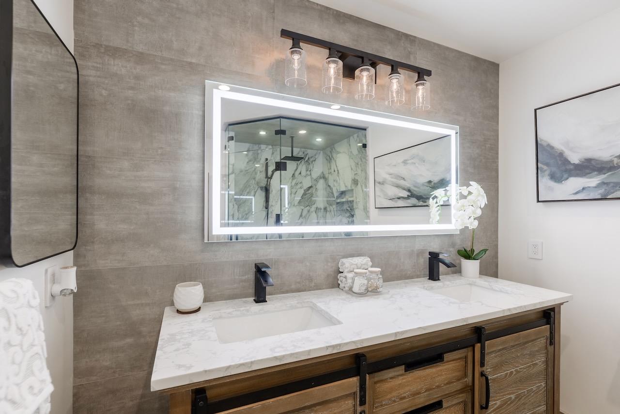 307 Sidesaddle Circle Scotts Valley, CA 95066 - Photo 75 of 116 a view of a bathroom with a sink and a mirror