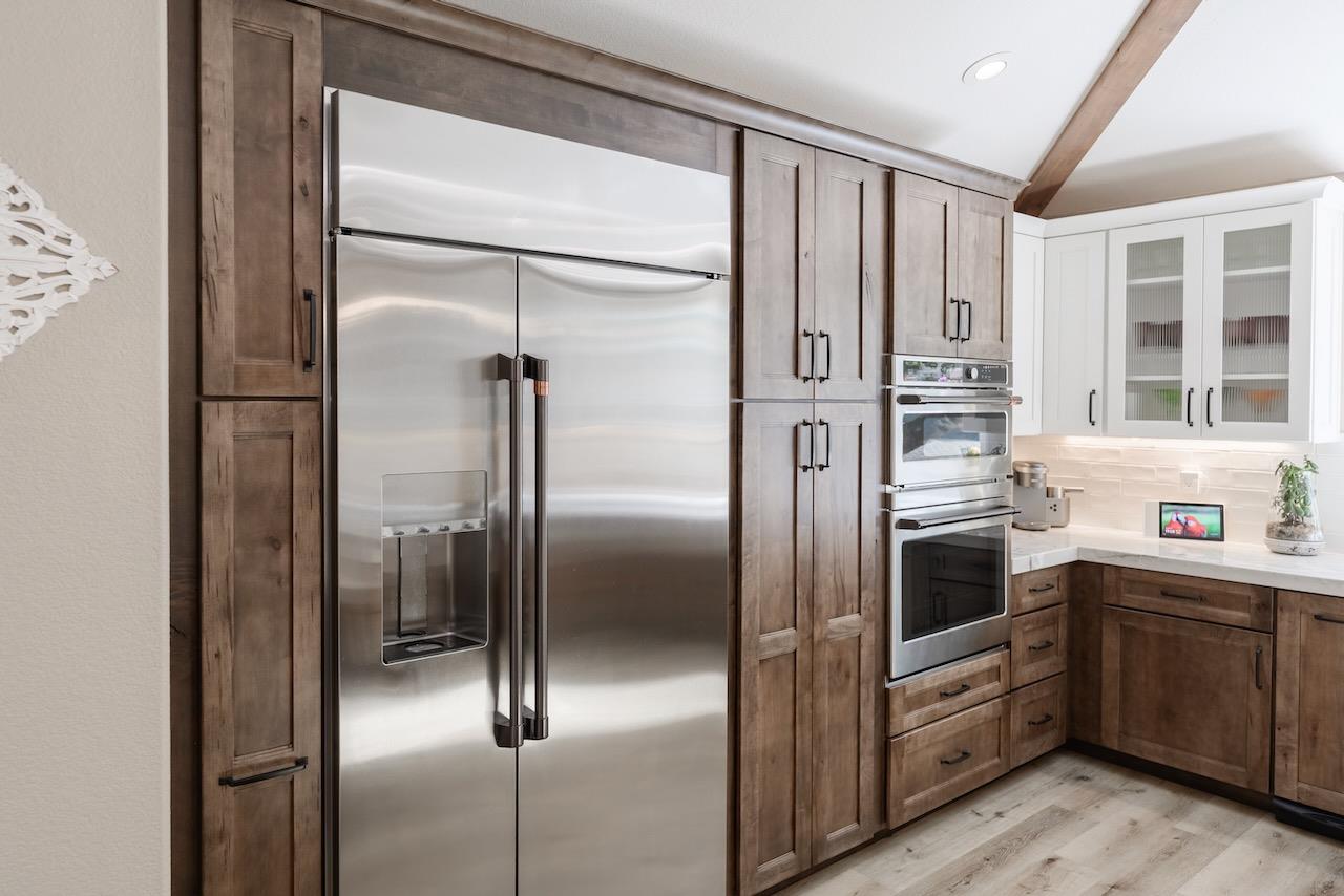 307 Sidesaddle Circle Scotts Valley, CA 95066 - Photo 10 of 116 a kitchen with stainless steel appliances granite countertop a refrigerator and a sink