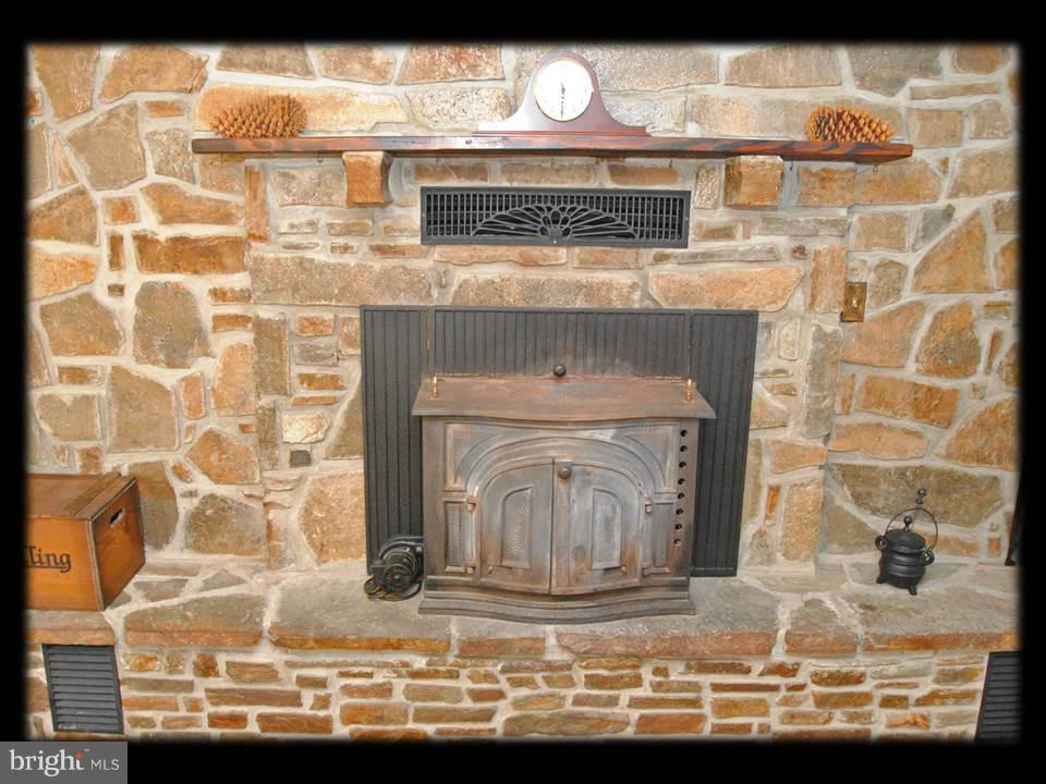 210 North Branch Road Baltimore, MD 21222 - Photo 15 of 30 CUSTOM STONE WALL FIREPLACE