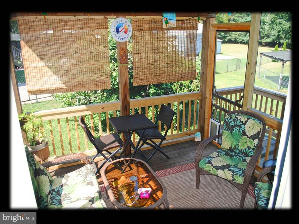 210 North Branch Road Baltimore, MD 21222 - Photo 21 of 30 INSIDE SCREENED IN PORCH