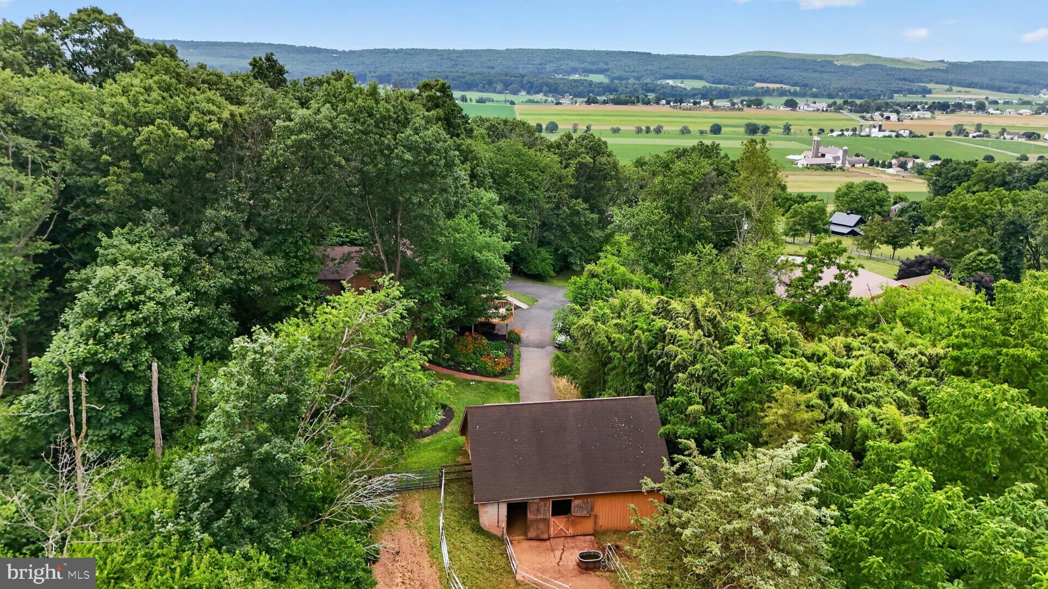 2571 Valley View Road Morgantown, PA 19543 - Photo 40 of 75 Serene retreat amidst lush greenery.