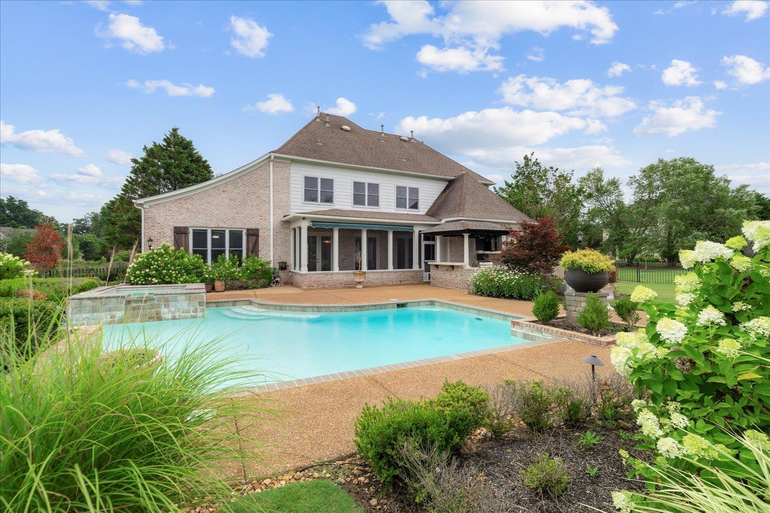 123 Jamerson Farm Road Collierville, TN 38017 - Photo 36 of 40 Exterior space with a sunroom and a patio