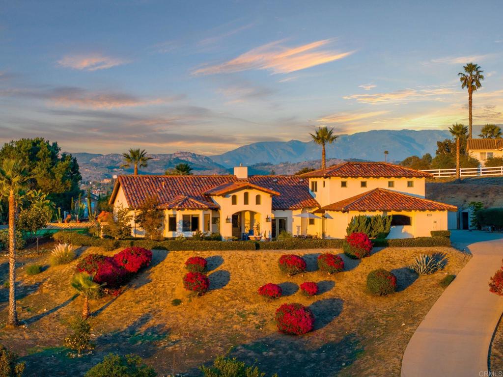 an aerial view of a houses with outdoor space