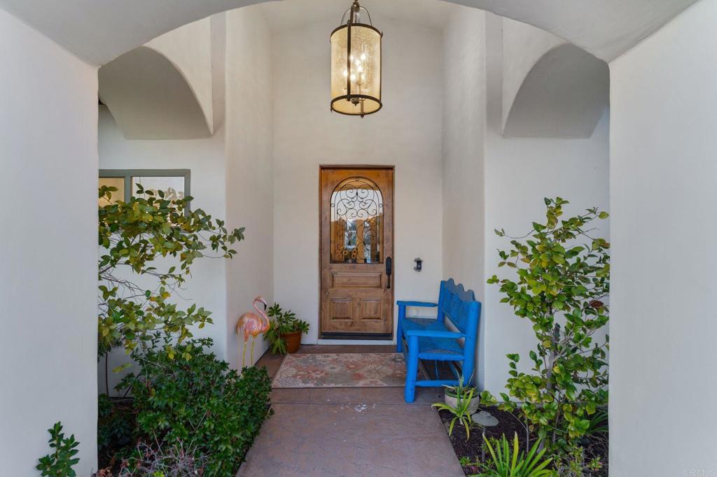9746 Megan Escondido, CA 92026 - Photo 11 of 65 a front view of a house with wooden floor