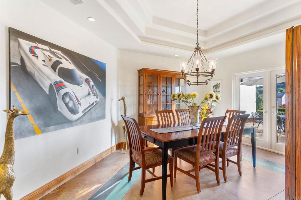 9746 Megan Escondido, CA 92026 - Photo 13 of 65 a view of a dining room with furniture wooden floor and chandelier