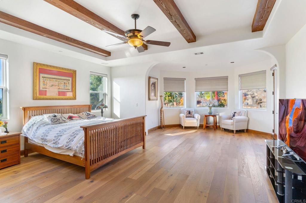 9746 Megan Escondido, CA 92026 - Photo 22 of 65 a bedroom with furniture and a wooden floor