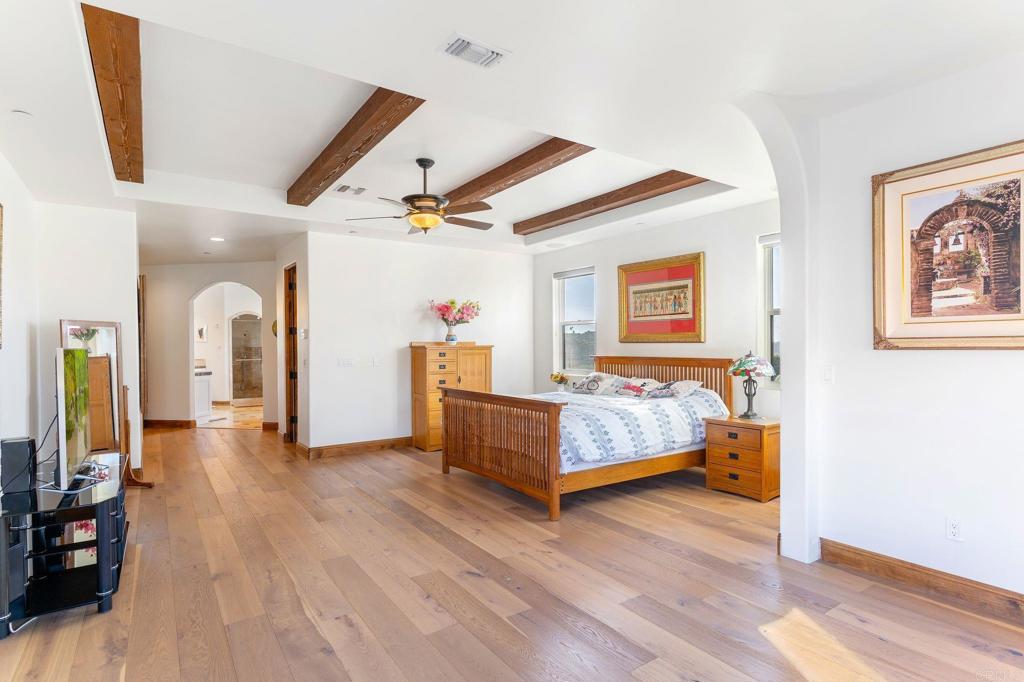 9746 Megan Escondido, CA 92026 - Photo 24 of 65 a bedroom with furniture and wooden floor