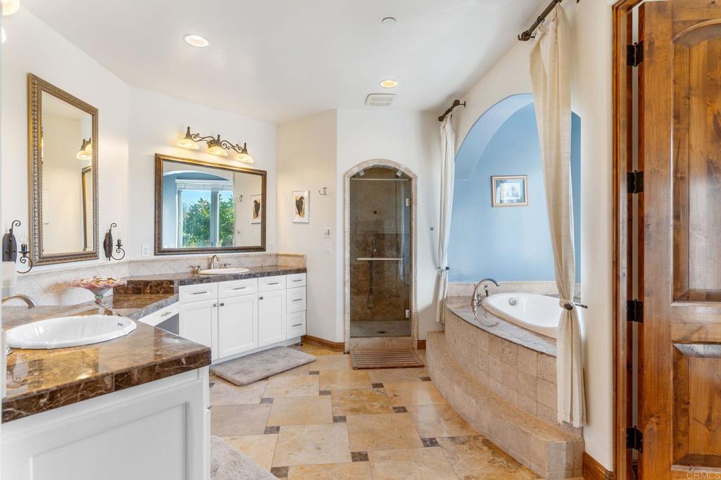 9746 Megan Escondido, CA 92026 - Photo 25 of 65 a bathroom with a granite countertop sink toilet and shower