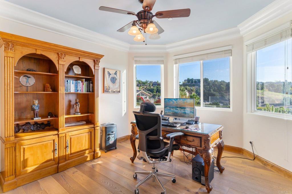 9746 Megan Escondido, CA 92026 - Photo 28 of 65 a view of a workspace with furniture and a window