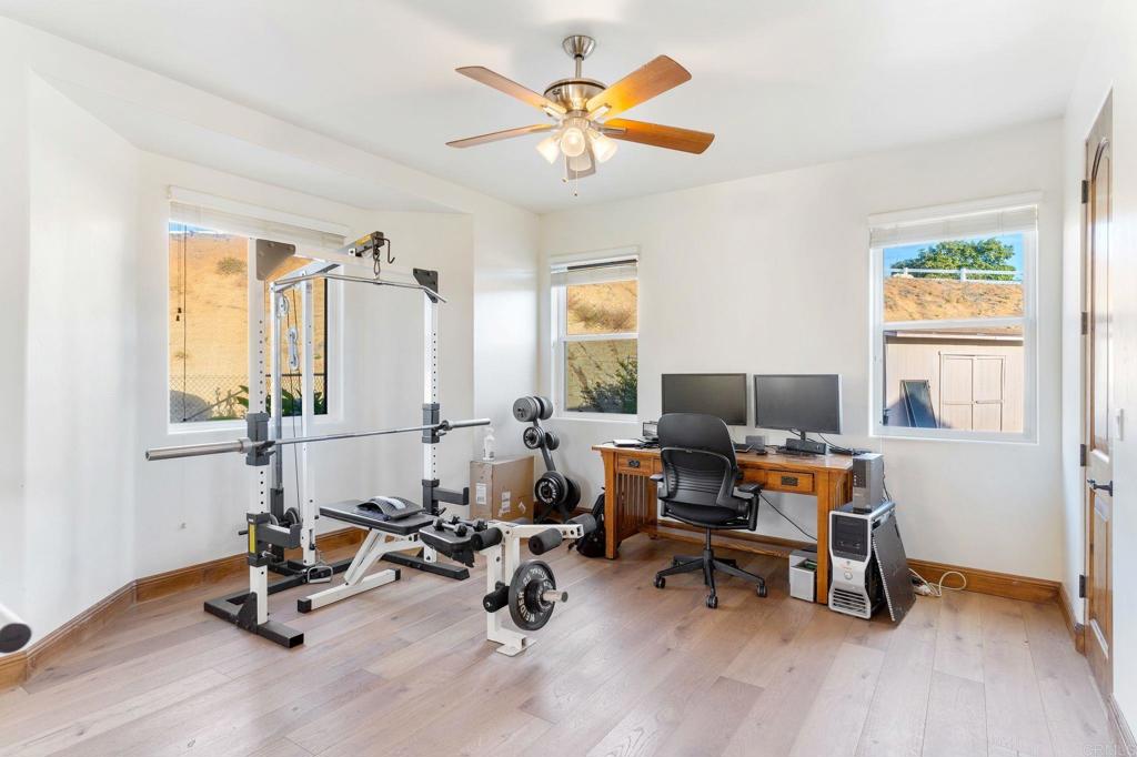 9746 Megan Escondido, CA 92026 - Photo 32 of 65 a view of a workspace with furniture and a window