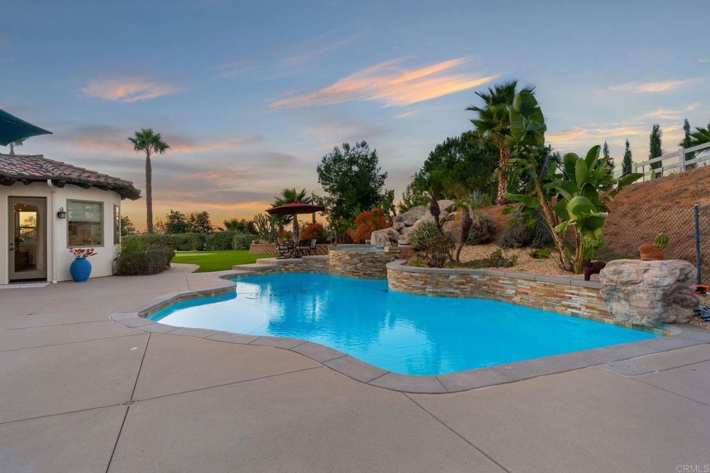 9746 Megan Escondido, CA 92026 - Photo 48 of 65 a view of a swimming pool with lounge chair