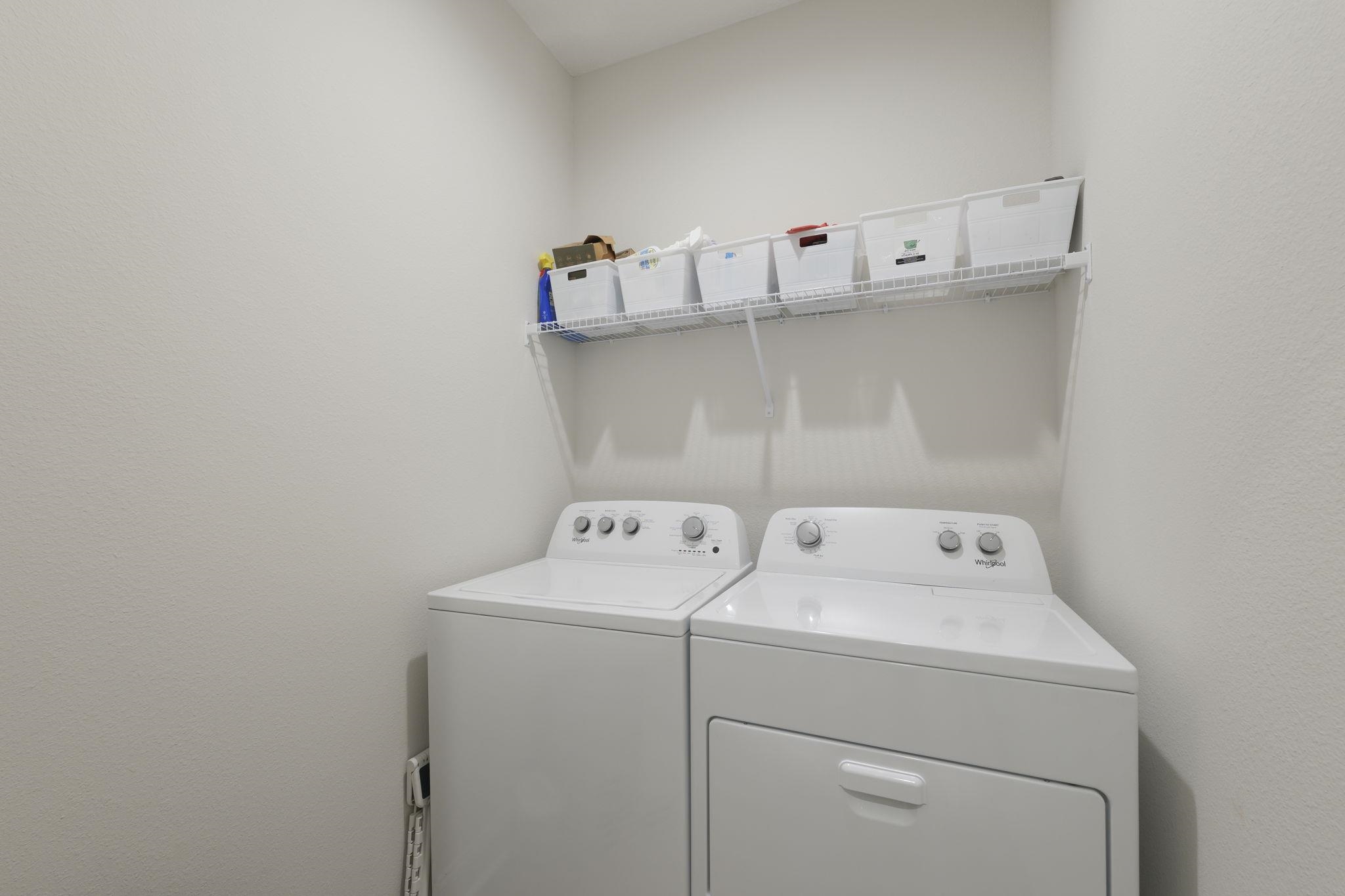 124 Swallow Road St. Augustine, FL 32086 - Photo 23 of 28 a utility room with dryer and washer