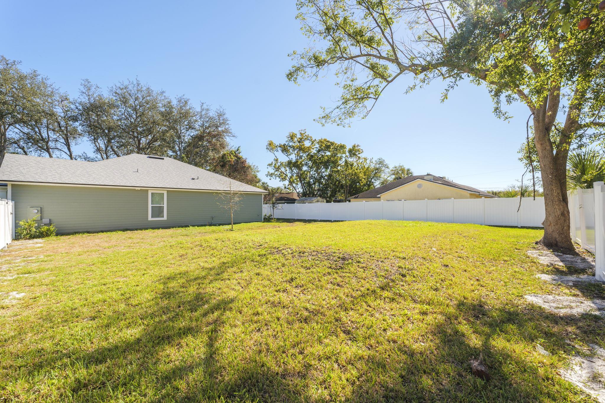 124 Swallow Road St. Augustine, FL 32086 - Photo 28 of 28 a view of an swimming pool with an outdoor space