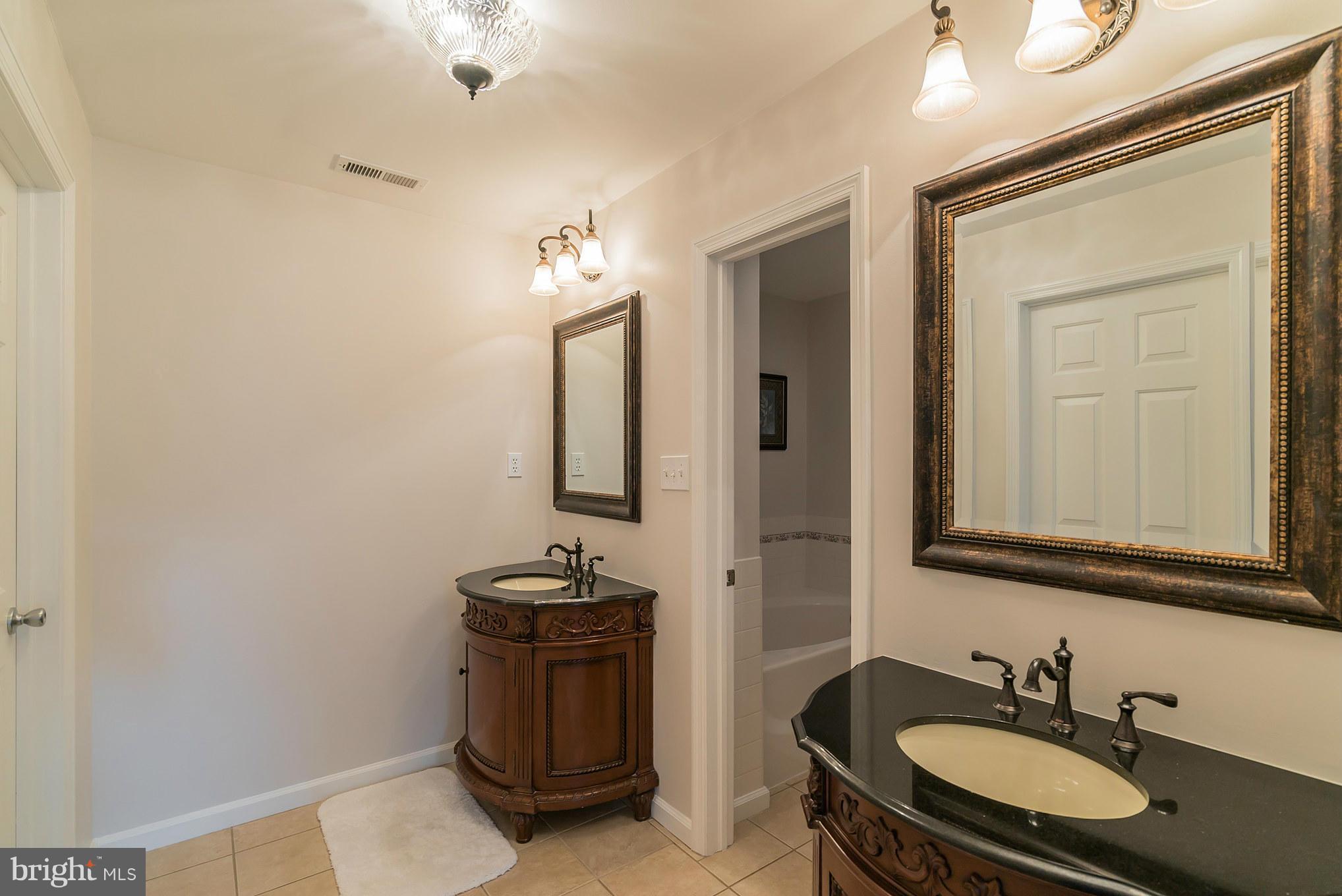 12888 Sagle Road Purcellville, VA 20132 - Photo 17 of 30 Master bath with 2 beautiful vanities