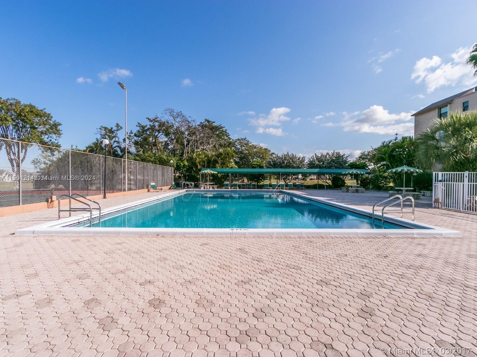 357 North Rock Island Road, Unit 304 Margate, FL 33063 - Photo 18 of 20 a view of swimming pool