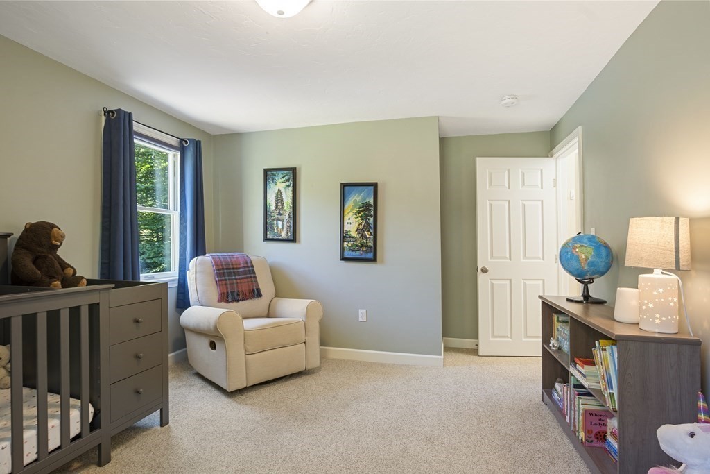 221 Red Acre Road Stow, MA 01775 - Photo 16 of 28 a living room with furniture and wooden floor