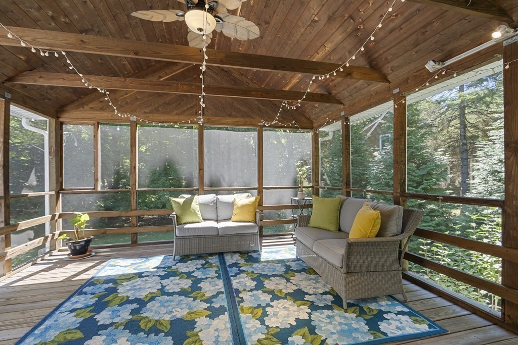221 Red Acre Road Stow, MA 01775 - Photo 23 of 28 a outdoor space with patio the couches and a dining table with the garden view