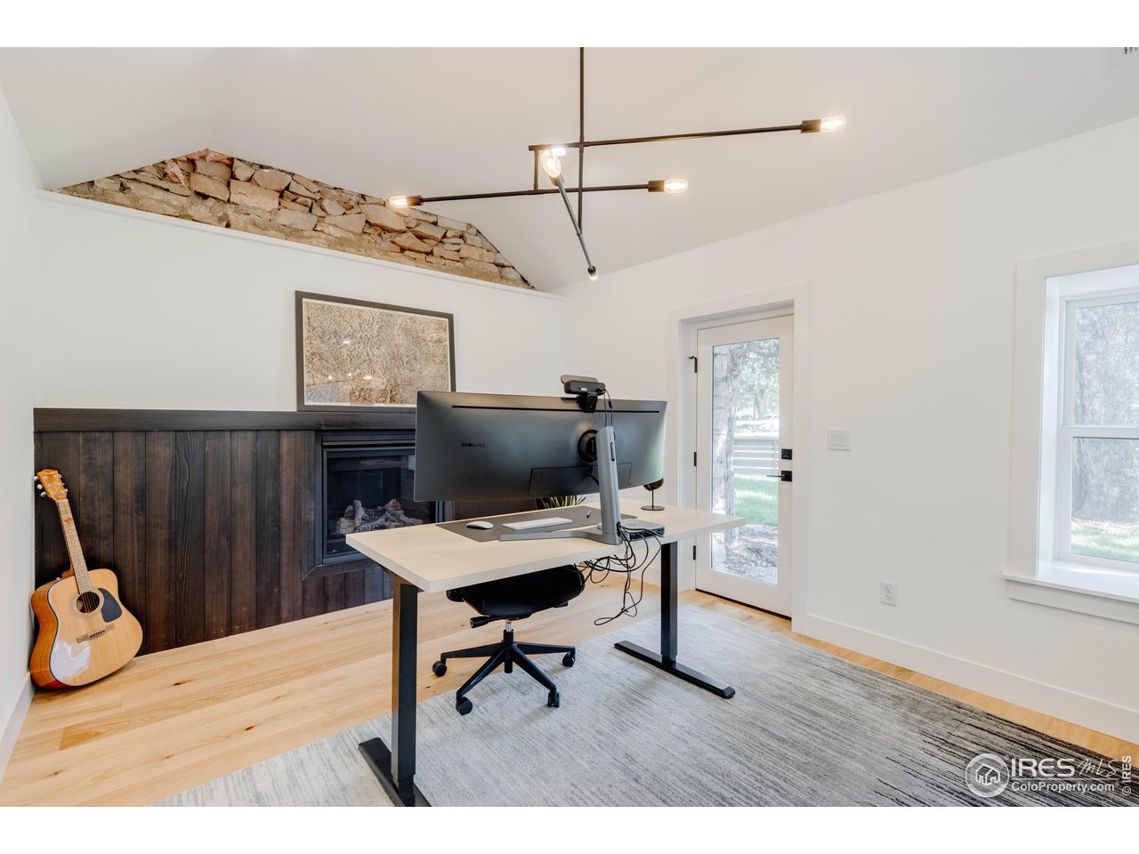 2795 14th Street Boulder, CO 80304 - Photo 12 of 31 Main Floor Office or Family Room with fireplace