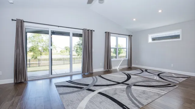 a view of a livingroom with furniture and window
