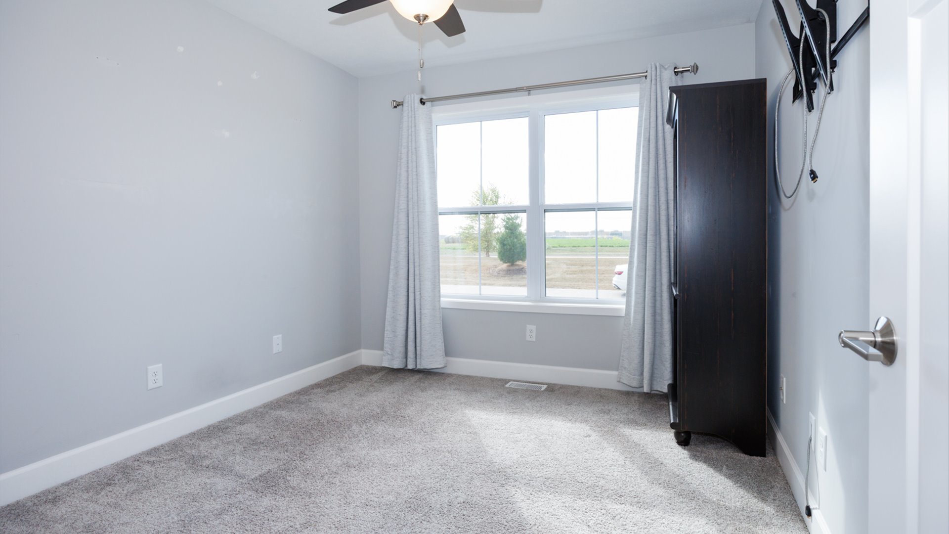 1104 Hershey Road Normal, IL 61761 - Photo 23 of 48 a view of an empty room with a window