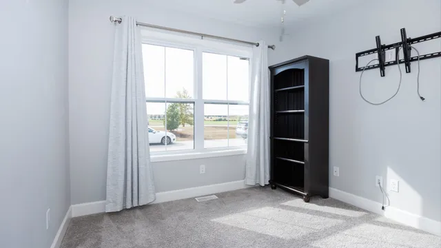 an empty room with windows