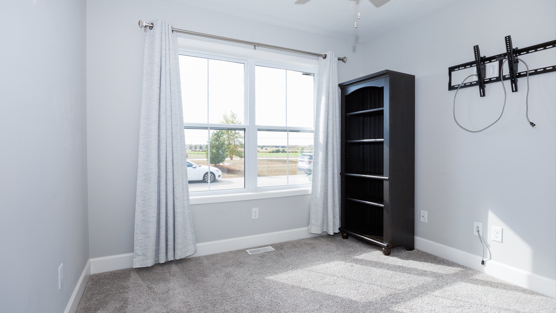 1104 Hershey Road Normal, IL 61761 - Photo 24 of 48 an empty room with windows