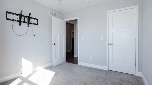 a view of a room with rack on the wall