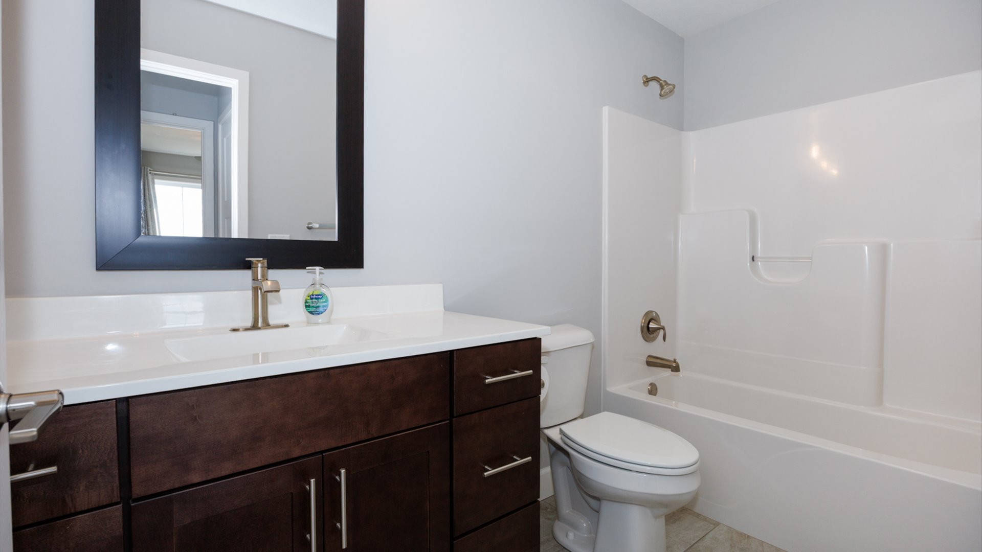 1104 Hershey Road Normal, IL 61761 - Photo 26 of 48 a bathroom with a sink toilet vanity and shower