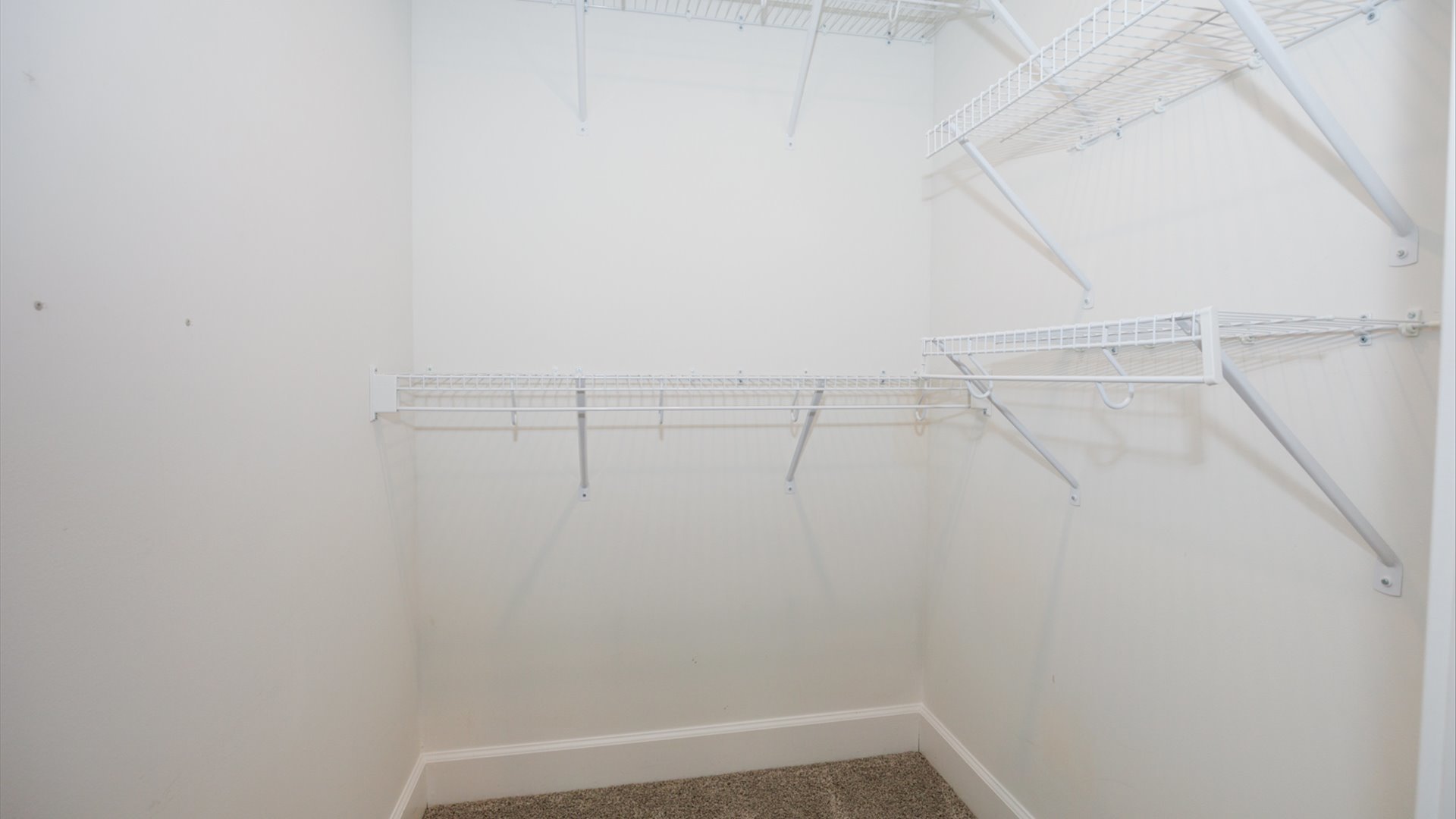 1104 Hershey Road Normal, IL 61761 - Photo 34 of 48 a view of small space with racks on the wall