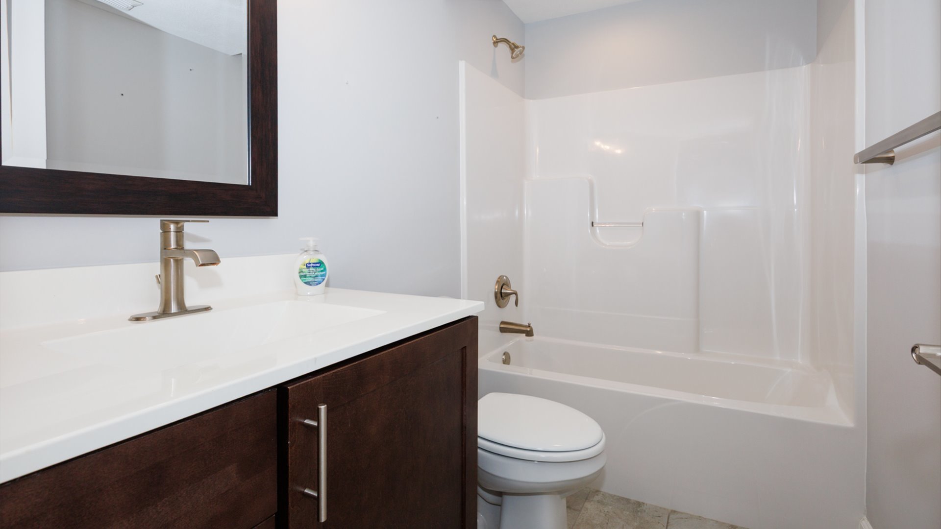 1104 Hershey Road Normal, IL 61761 - Photo 35 of 48 a bathroom with a sink a toilet a mirror and shower