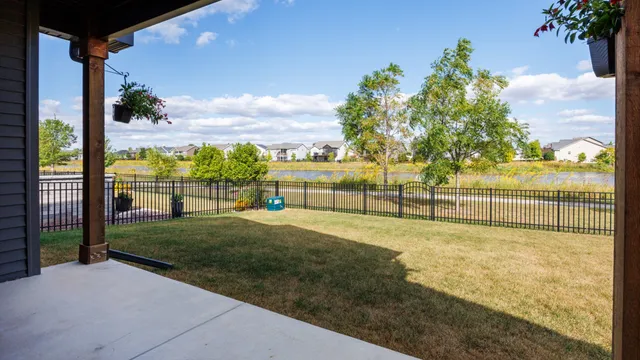 a view of a pathway with a yard