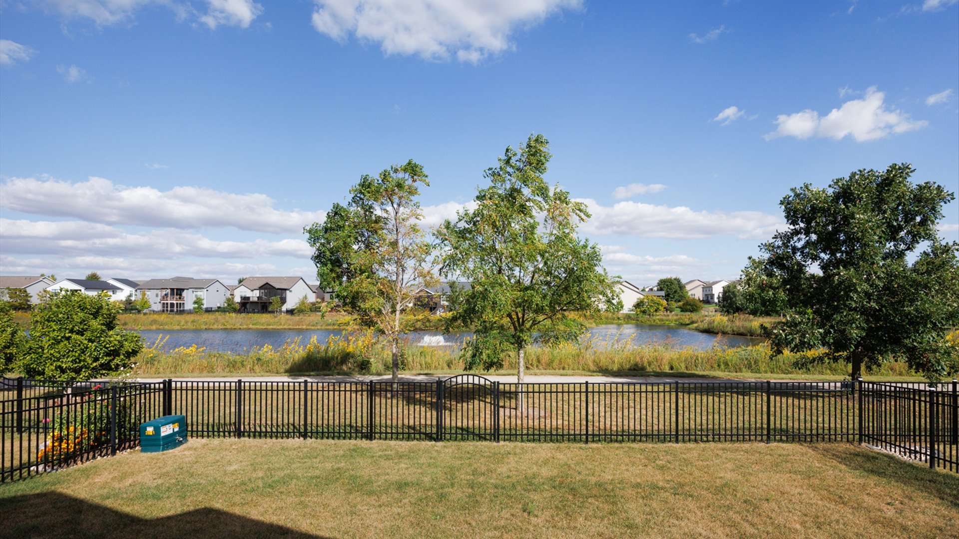 1104 Hershey Road Normal, IL 61761 - Photo 46 of 48 a view of lake with iron fence