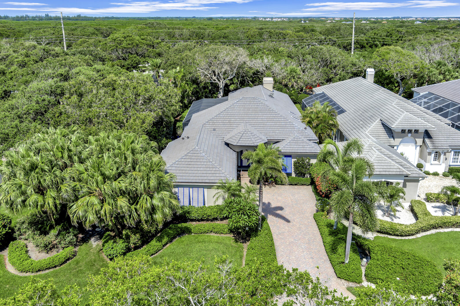 201 Seaside Pathway Vero Beach, FL 32963 - Photo 21 of 53 a aerial view of a house with garden