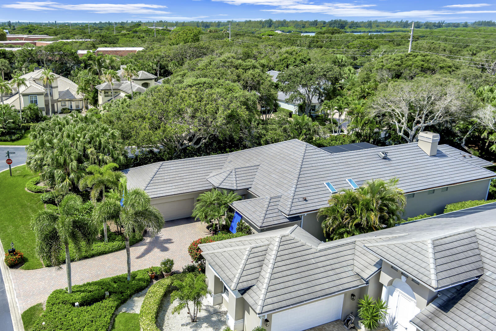201 Seaside Pathway Vero Beach, FL 32963 - Photo 35 of 53 an aerial view of a house with a yard large trees and plants