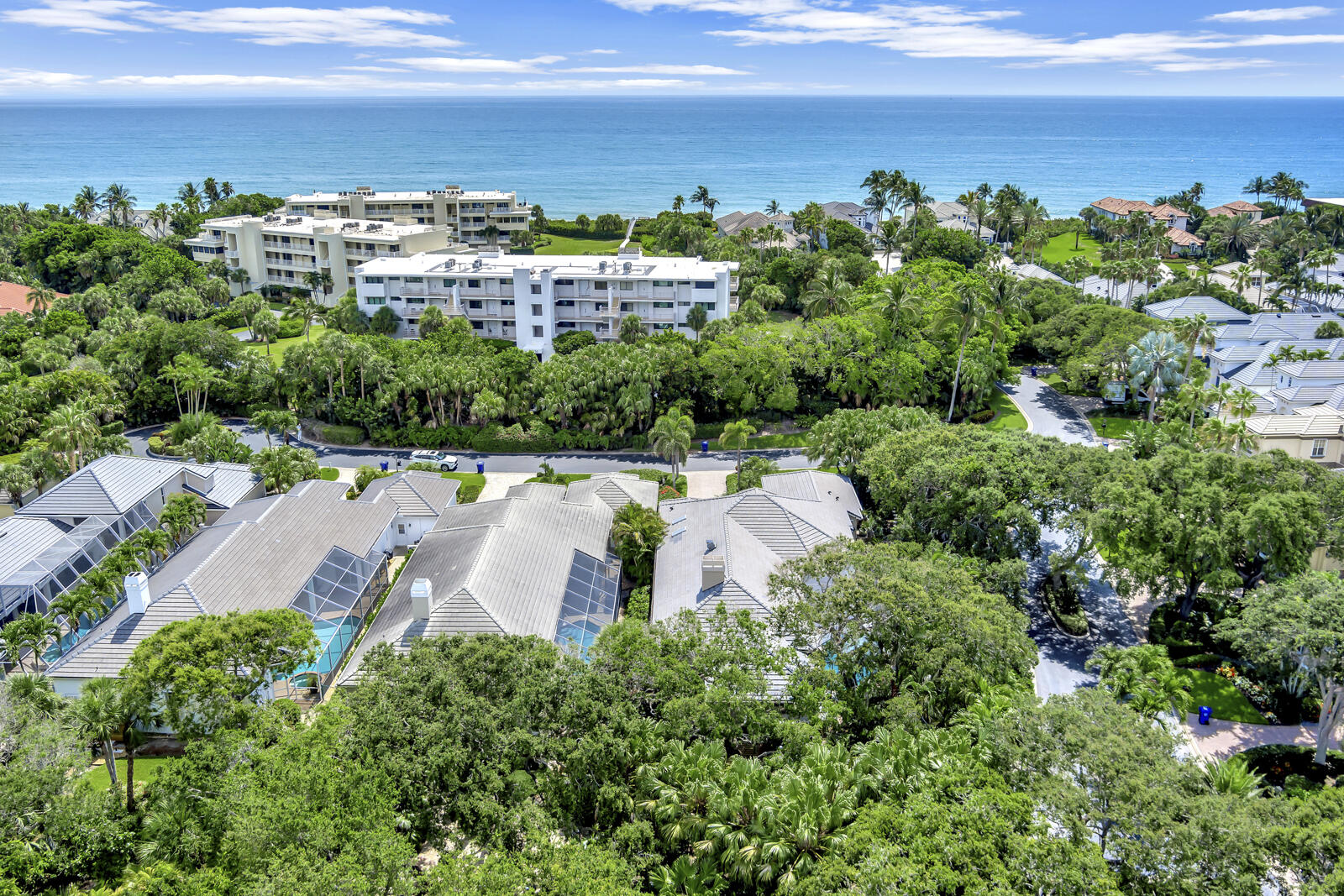 201 Seaside Pathway Vero Beach, FL 32963 - Photo 36 of 53 an aerial view of a city with lots of residential buildings ocean and mountain view in back