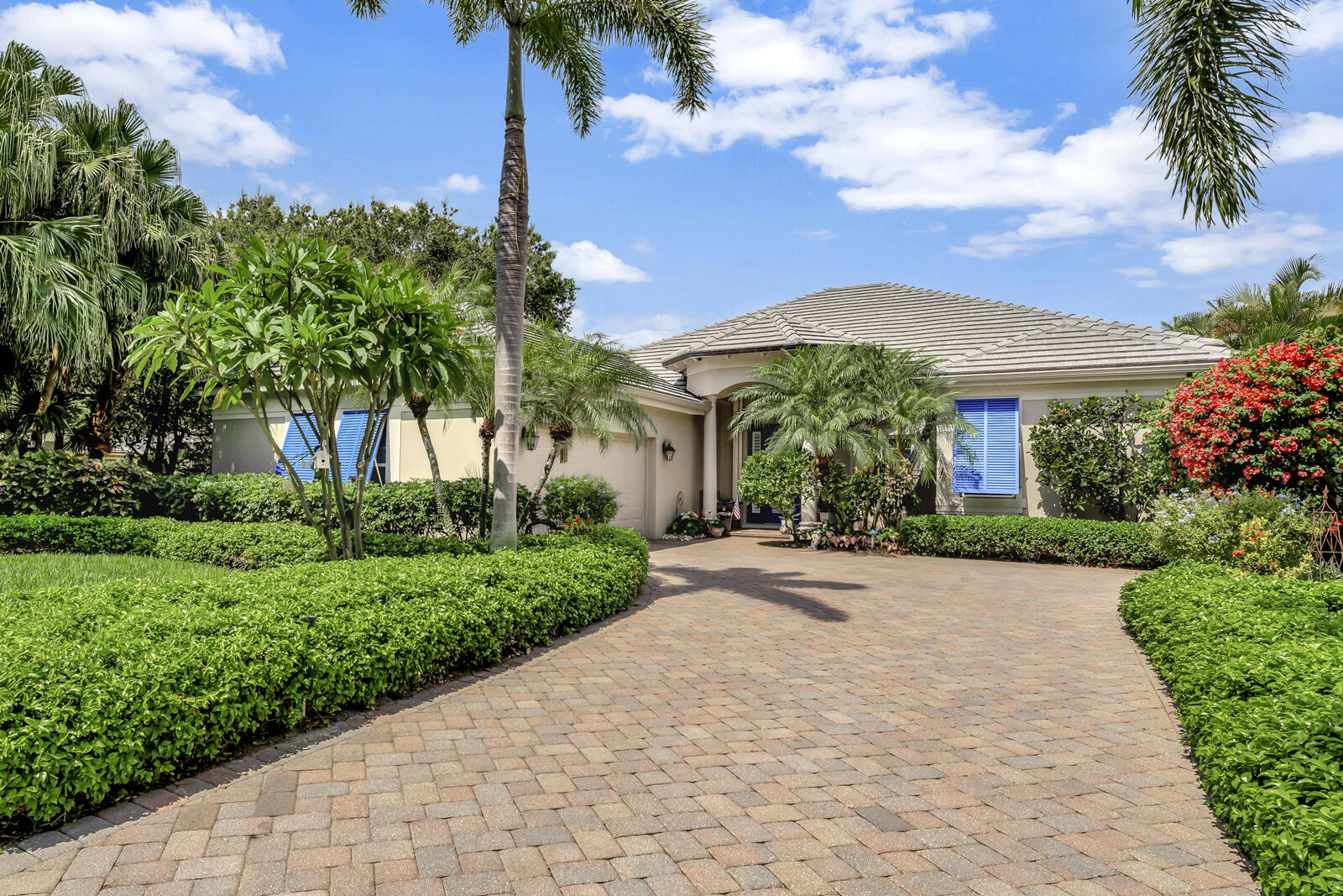 201 Seaside Pathway Vero Beach, FL 32963 - Photo 39 of 53 a front view of a house with garden