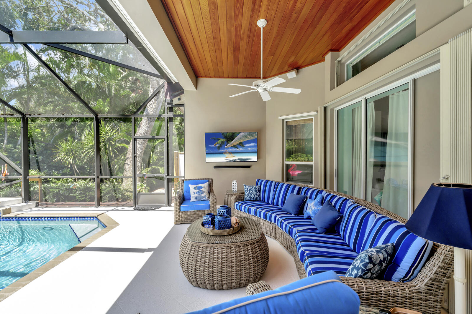 201 Seaside Pathway Vero Beach, FL 32963 - Photo 47 of 53 a outdoor living area with furniture and a large window