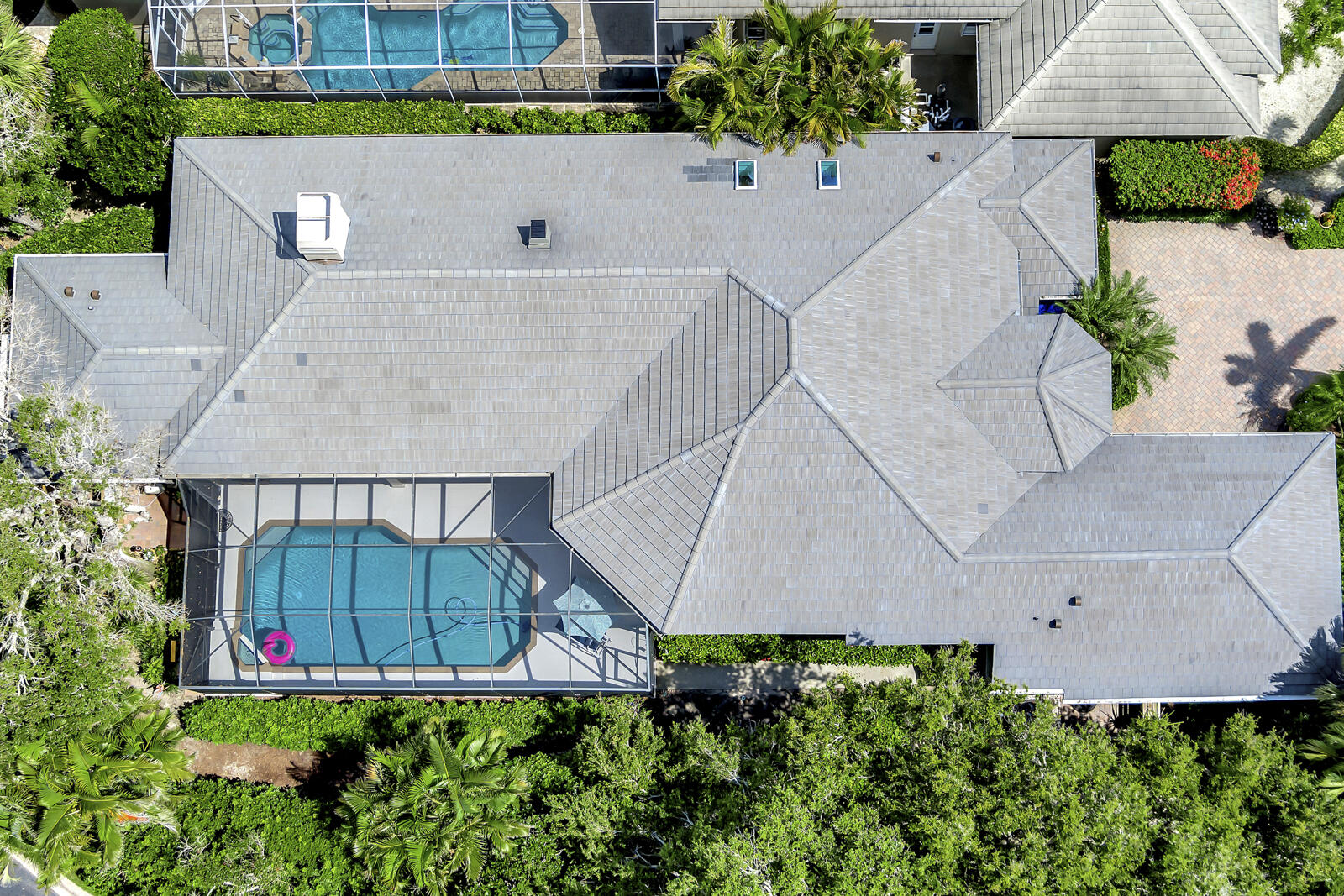 201 Seaside Pathway Vero Beach, FL 32963 - Photo 50 of 53 an aerial view of a house with a yard and a bench