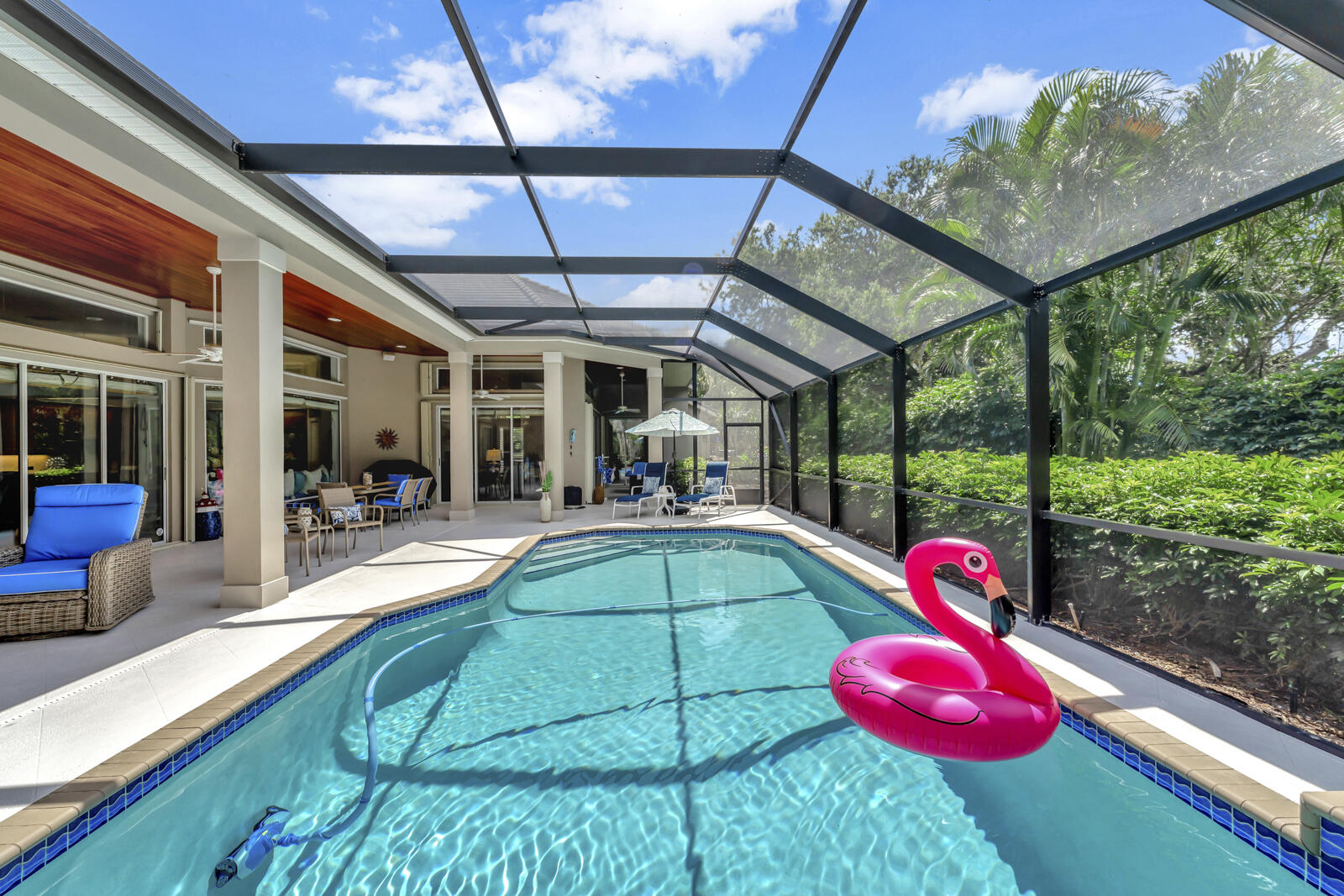 201 Seaside Pathway Vero Beach, FL 32963 - Photo 51 of 53 a view of a backyard with a table and chairs