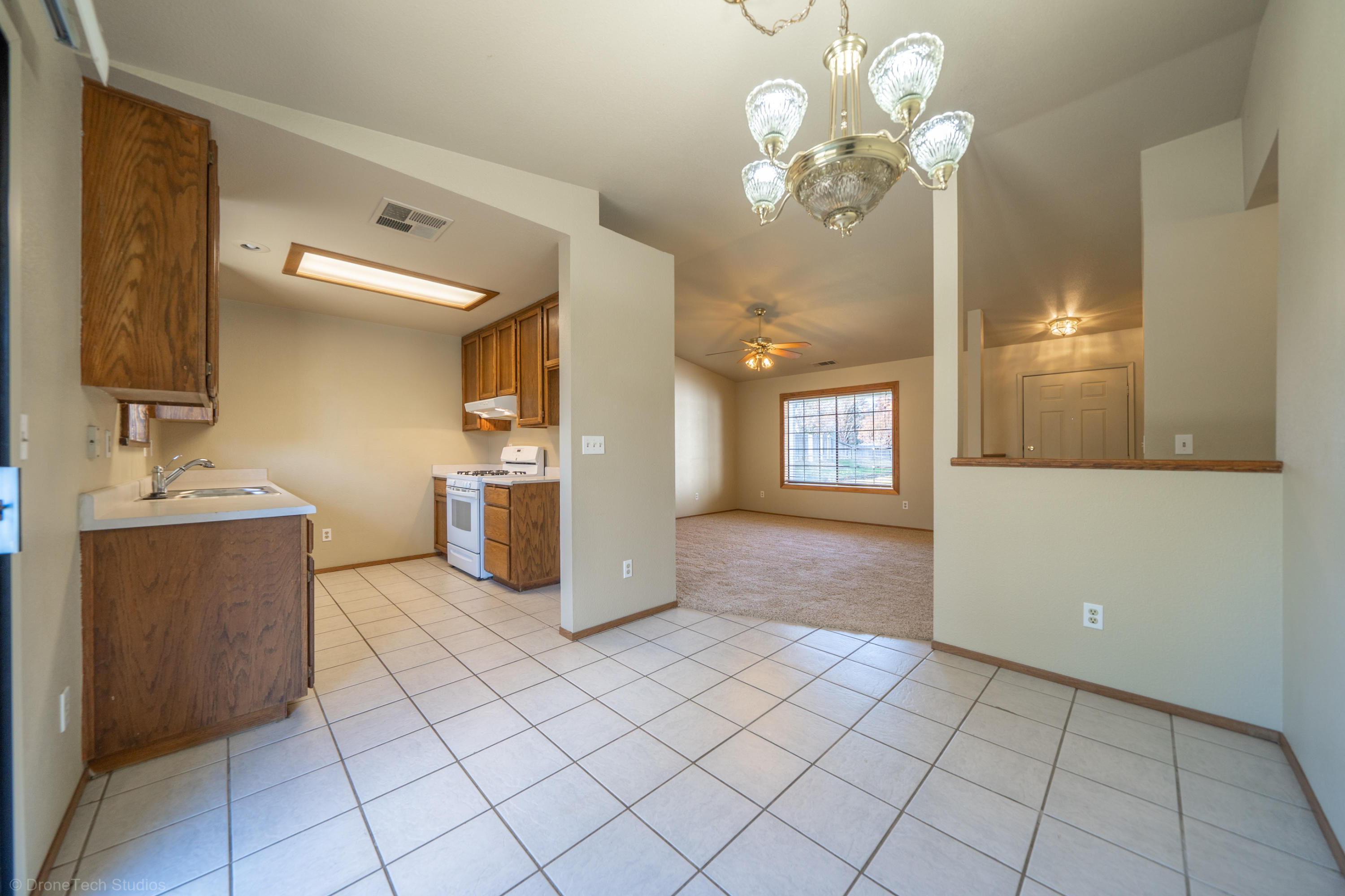3645 Santa Rosa Way Redding, CA 96003 - Photo 13 of 48 a bathroom with a sink a mirror and a shower