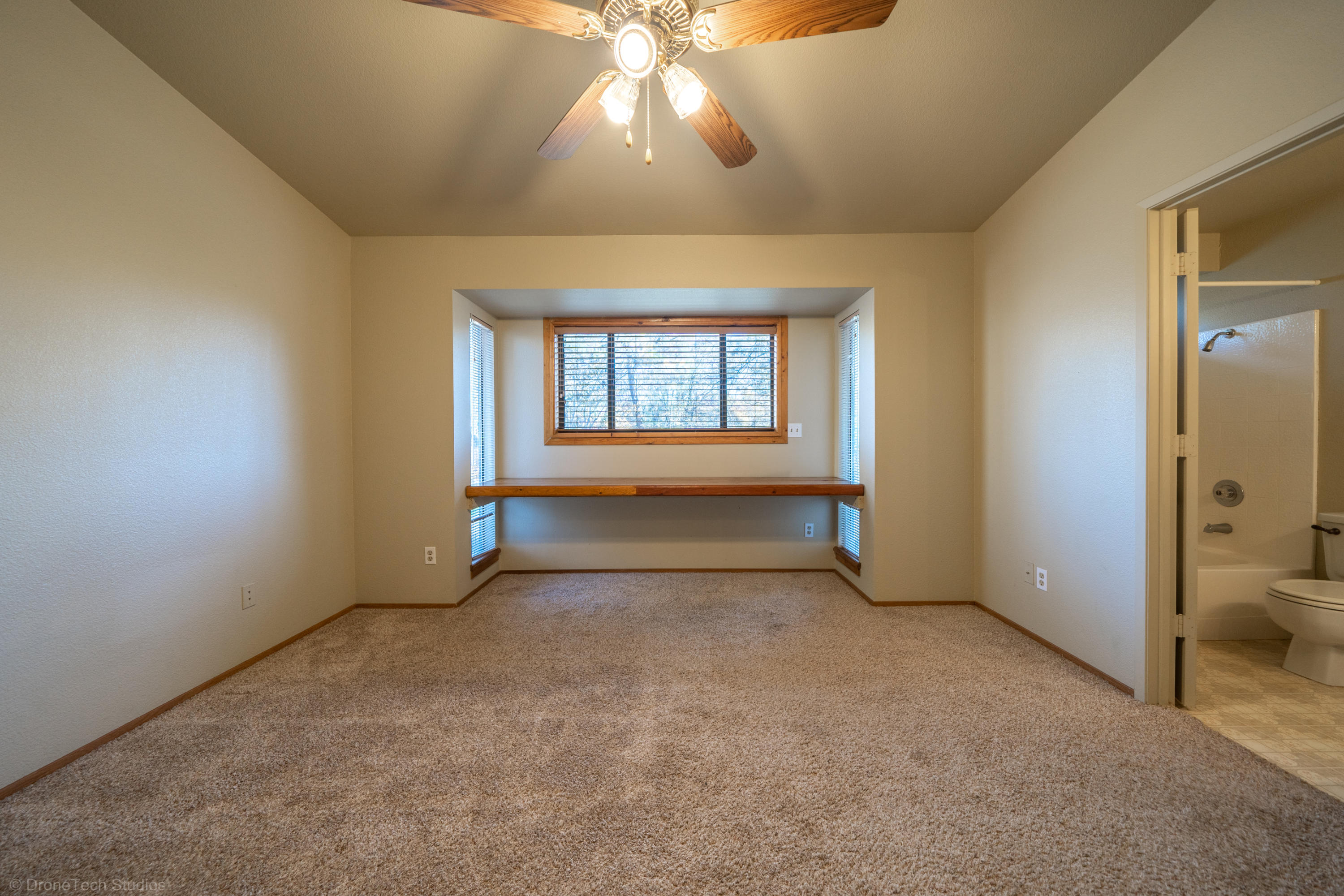 3645 Santa Rosa Way Redding, CA 96003 - Photo 19 of 48 an empty room with a empty space and windows
