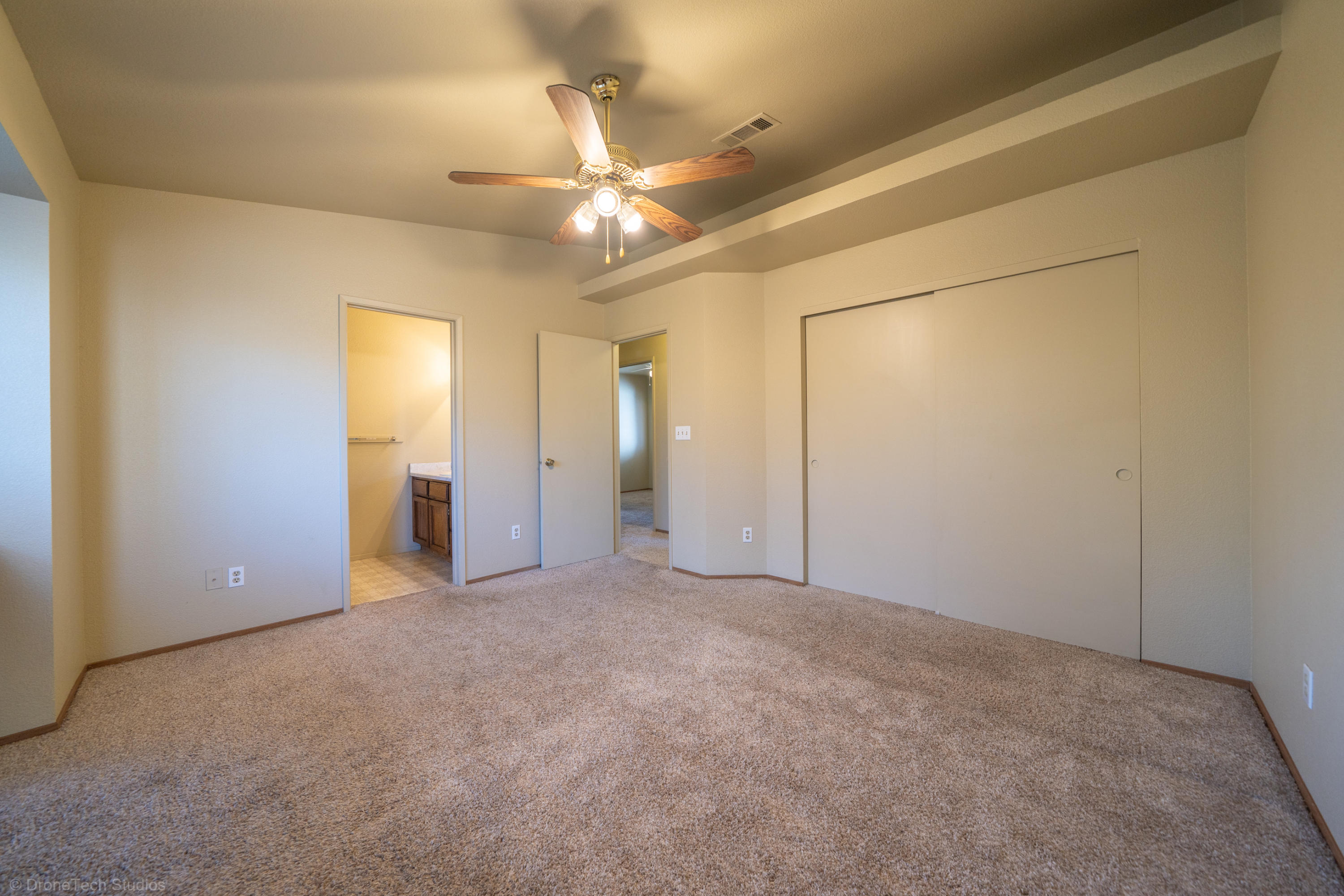 3645 Santa Rosa Way Redding, CA 96003 - Photo 21 of 48 an empty room with fan and entrance
