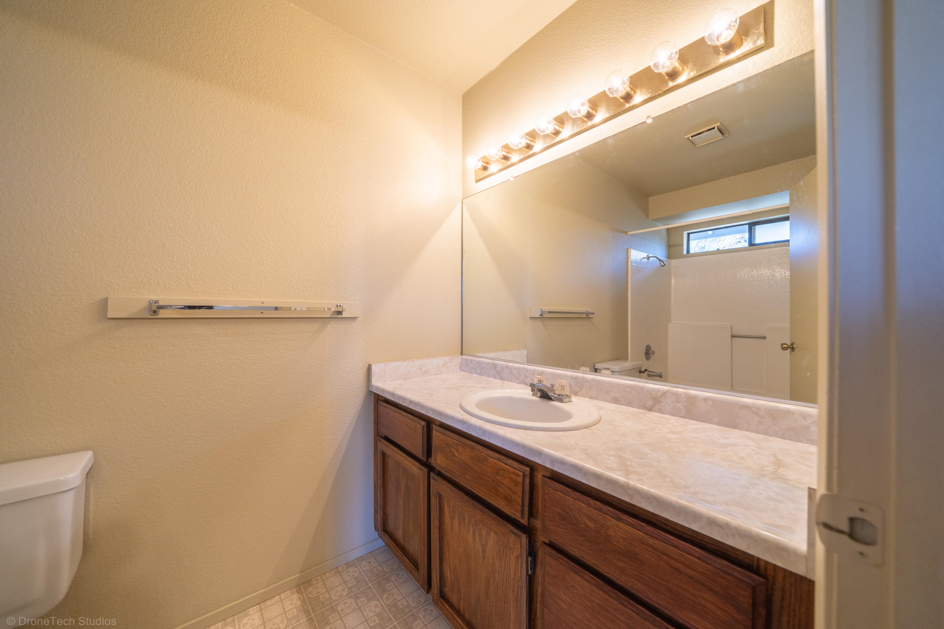 3645 Santa Rosa Way Redding, CA 96003 - Photo 23 of 48 a bathroom with a sink and a mirror
