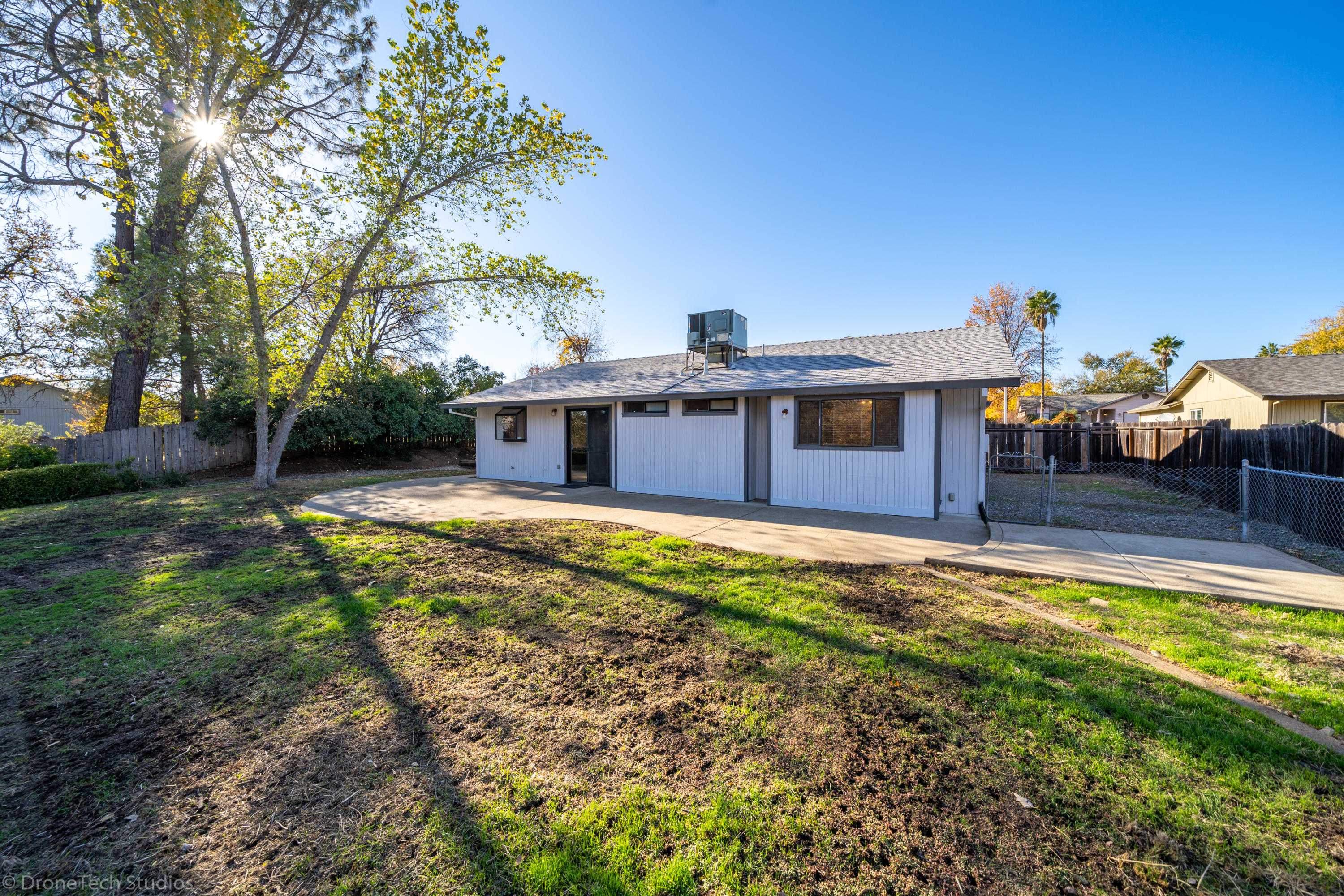 3645 Santa Rosa Way Redding, CA 96003 - Photo 34 of 48 a view of a house with a yard