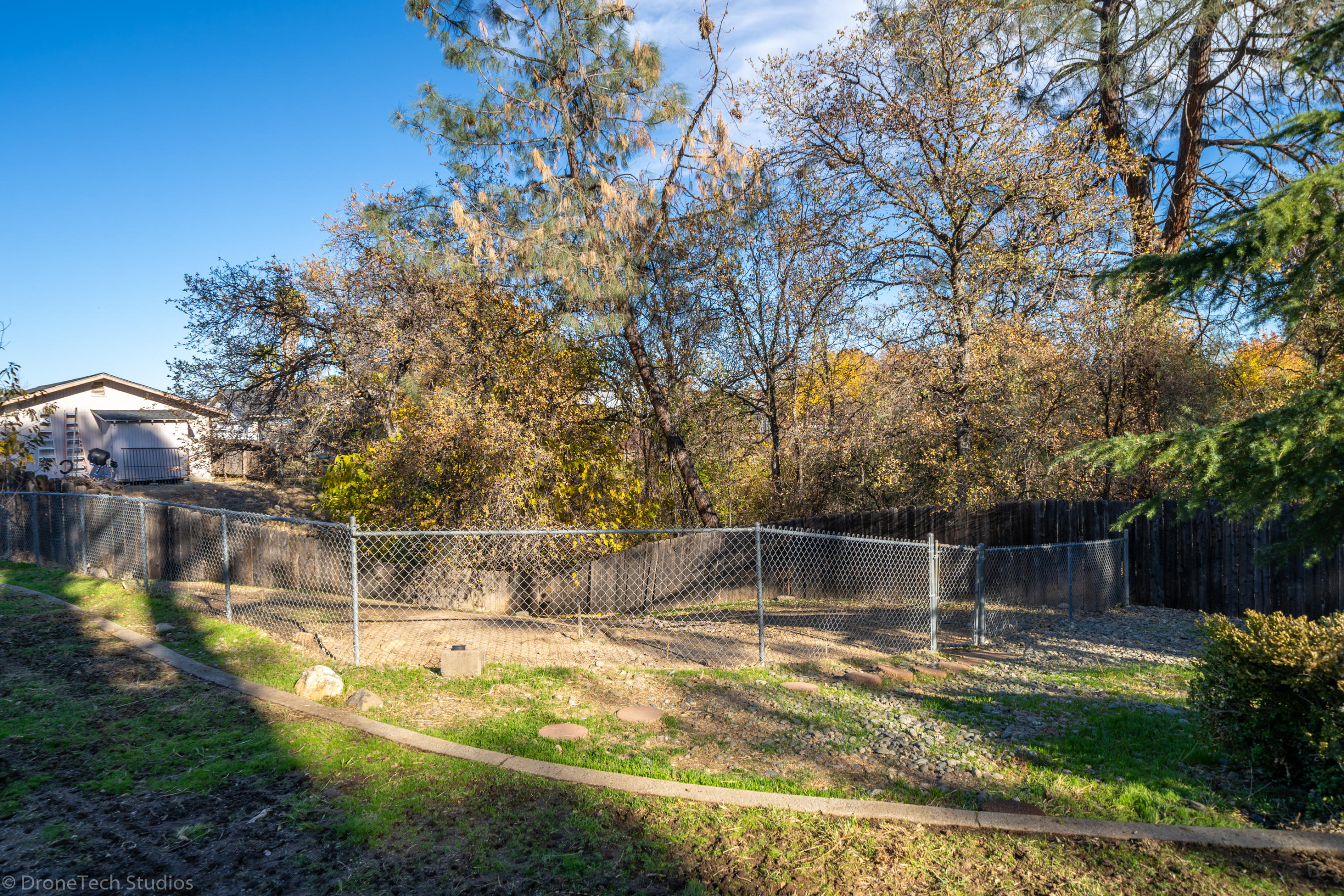 3645 Santa Rosa Way Redding, CA 96003 - Photo 40 of 48 a view of a backyard