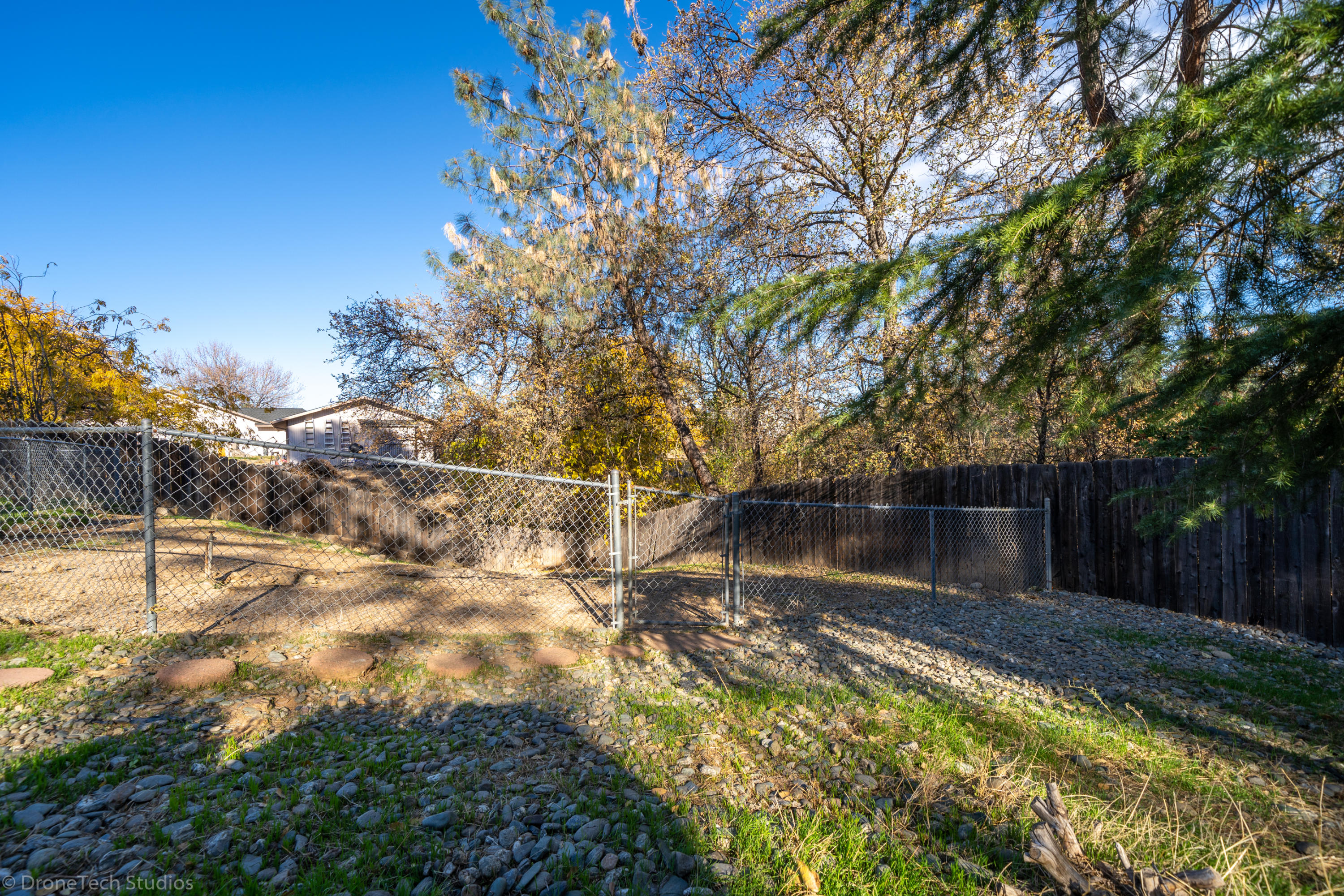 3645 Santa Rosa Way Redding, CA 96003 - Photo 41 of 48 a view of a lake with a yard