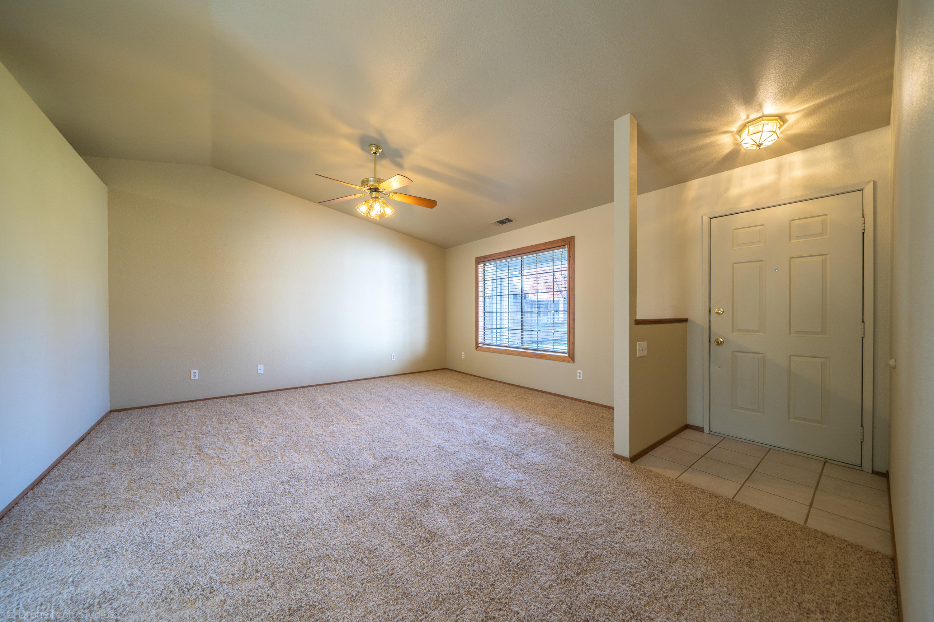 3645 Santa Rosa Way Redding, CA 96003 - Photo 5 of 48 an empty room with windows and closet