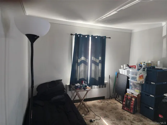 a room with furniture and a mirror